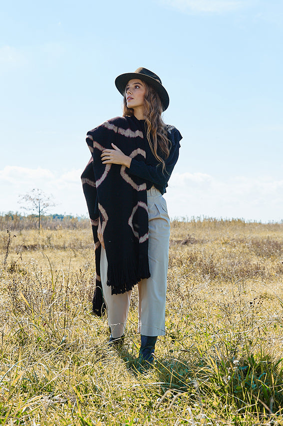 Black natural dyed Huinganco poncho made with plangit tie-dye technique