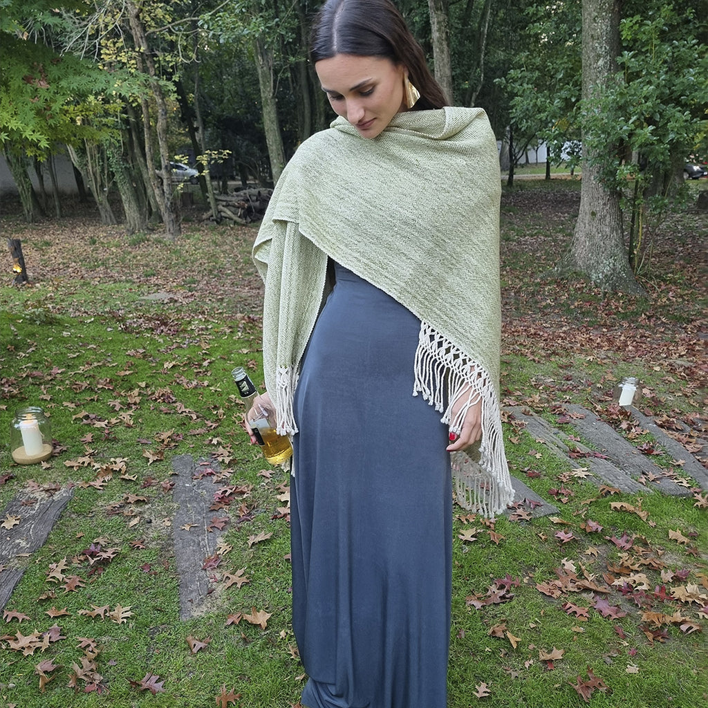 Bosque Claro lightweight wool ruana in soft green and cream tones