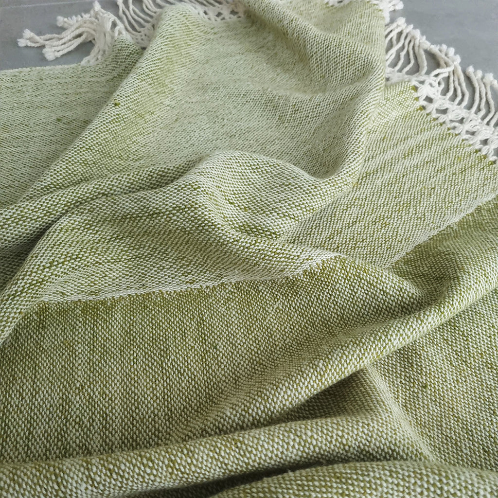 Bosque Claro ruana with natural palette and fringed finish