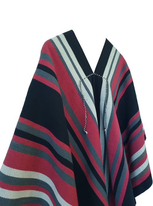 Close-up of Chaltén Listado poncho with red, green-gray and natural stripe details