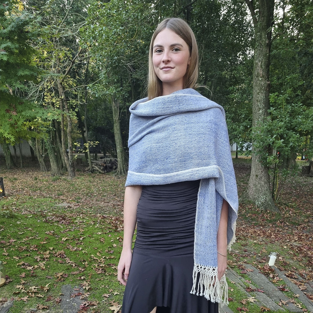 Lightweight wool shawl worn outdoors over the shoulders