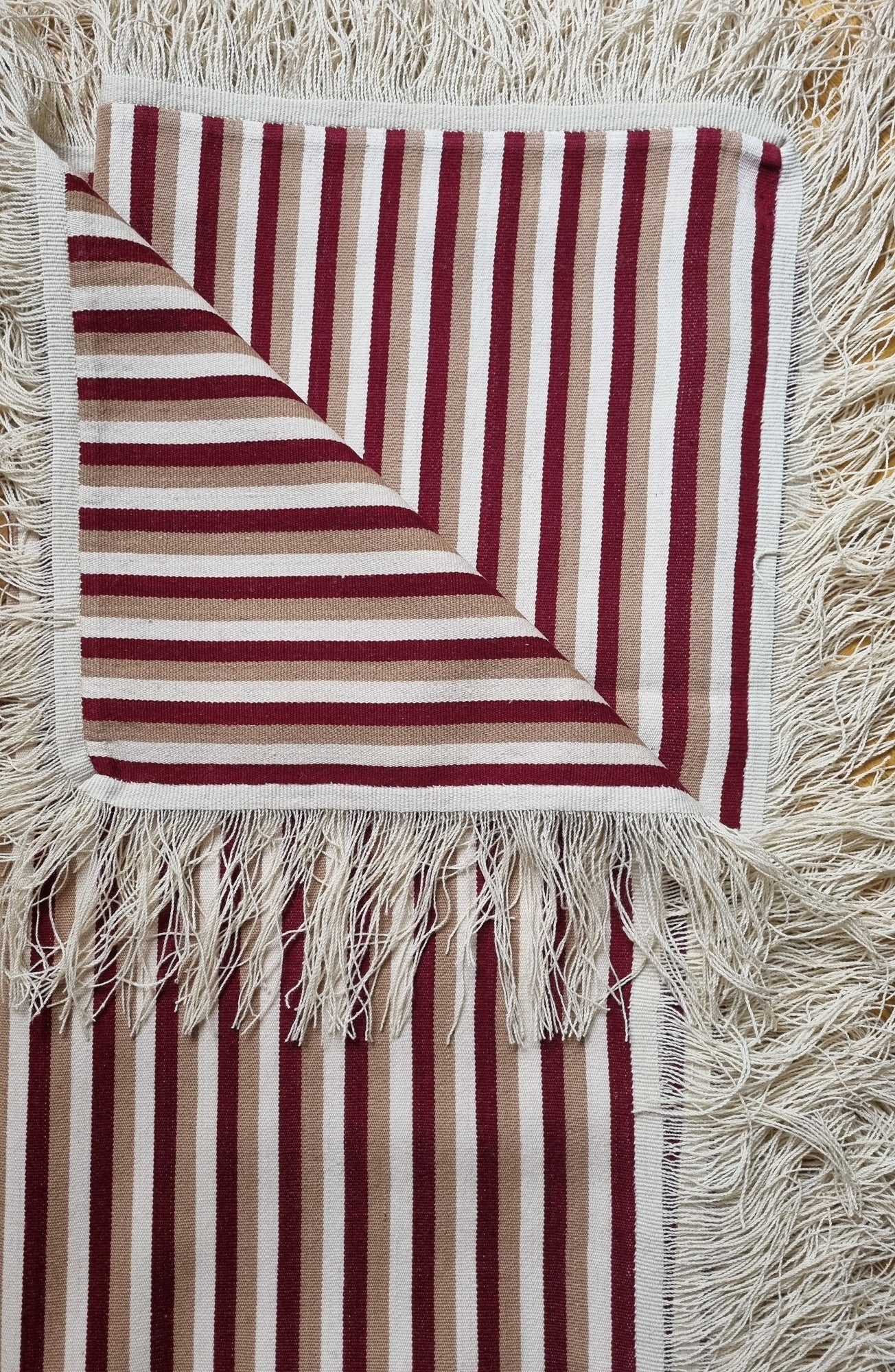 Moño salteño neckline knot on Seclantas handwoven poncho