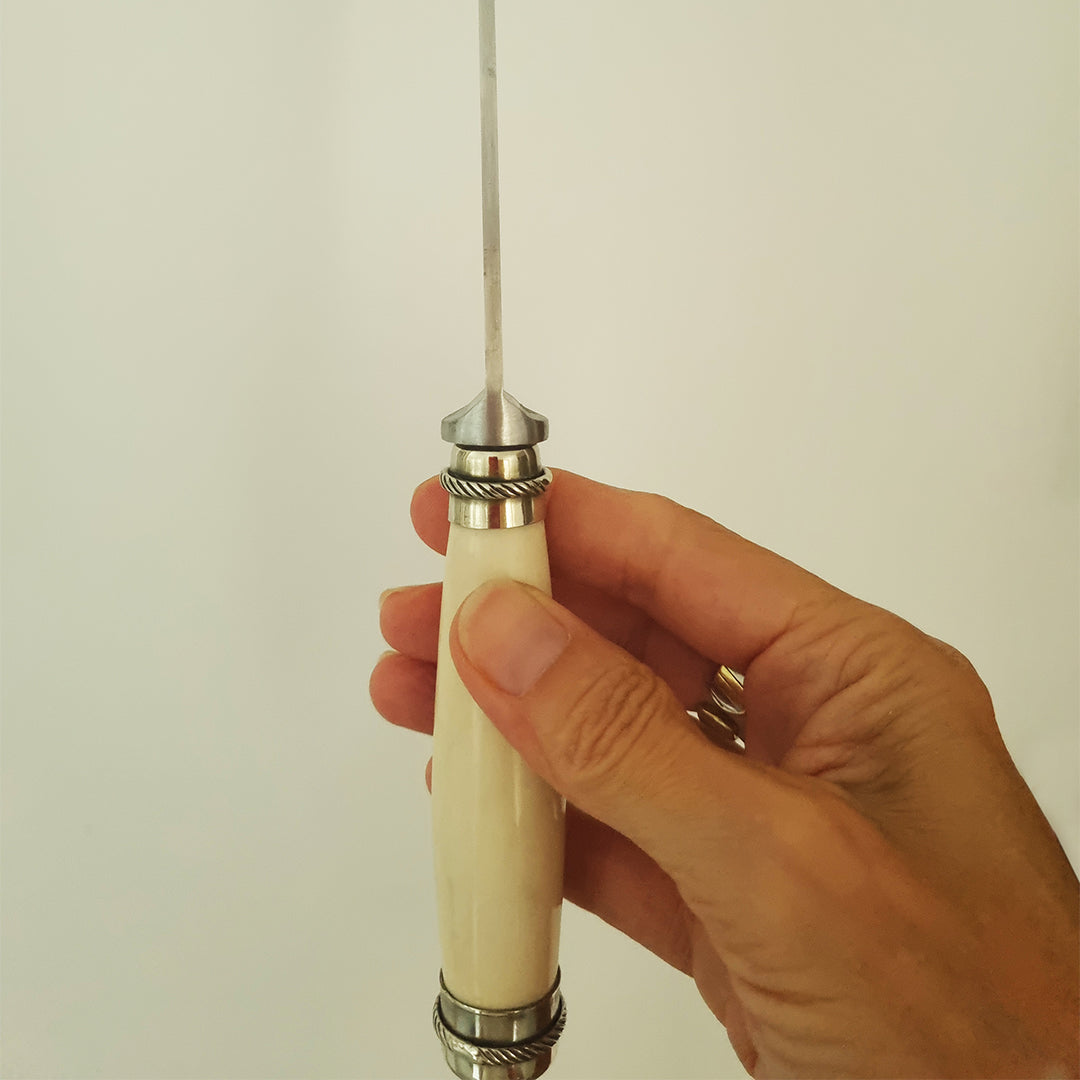Polished potro bone hilt knife