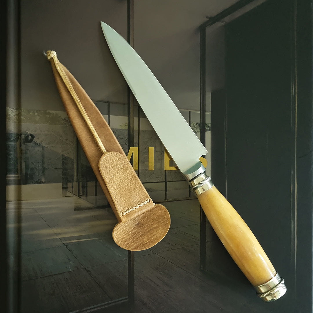 Polished yellow potro bone hilt knife