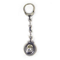Silver 900 keychain with polo helmet motif