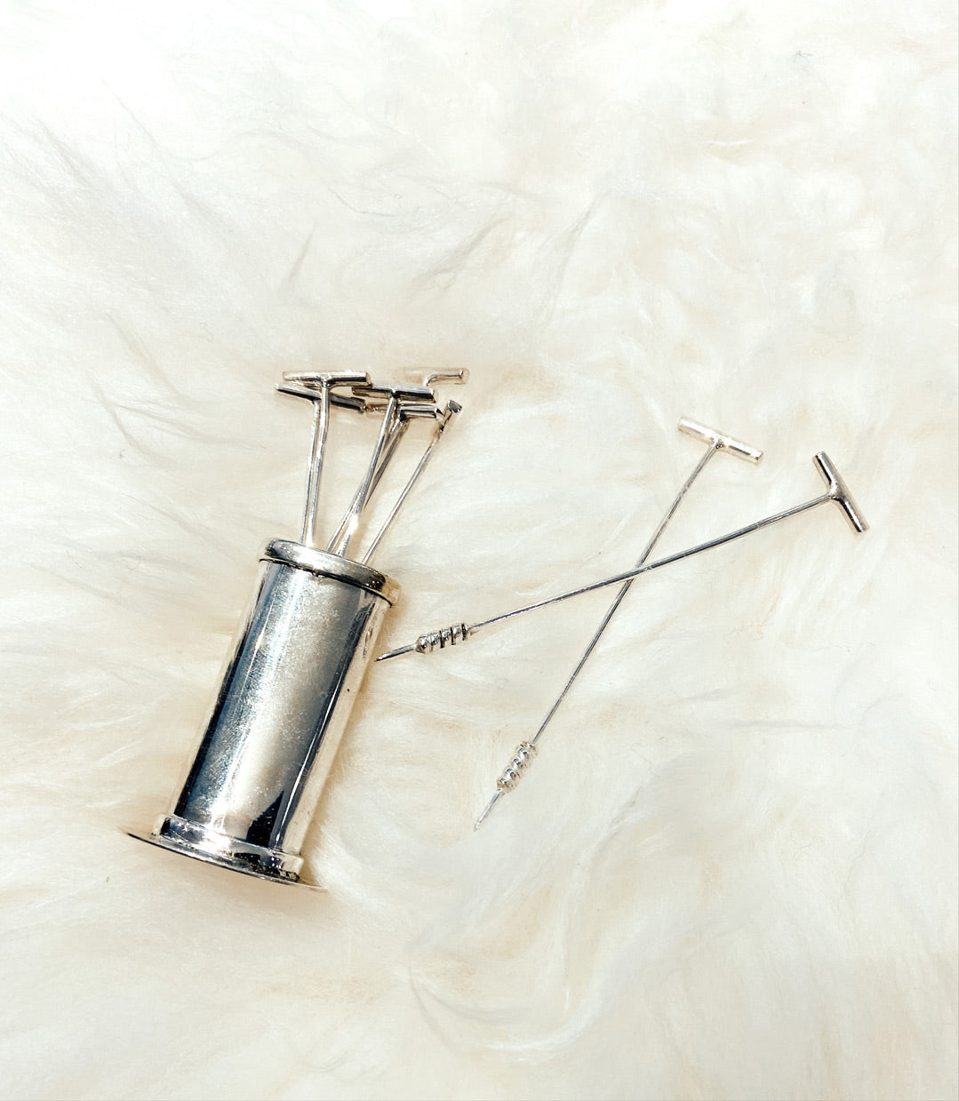 Silver 900 martini picks with polo motif